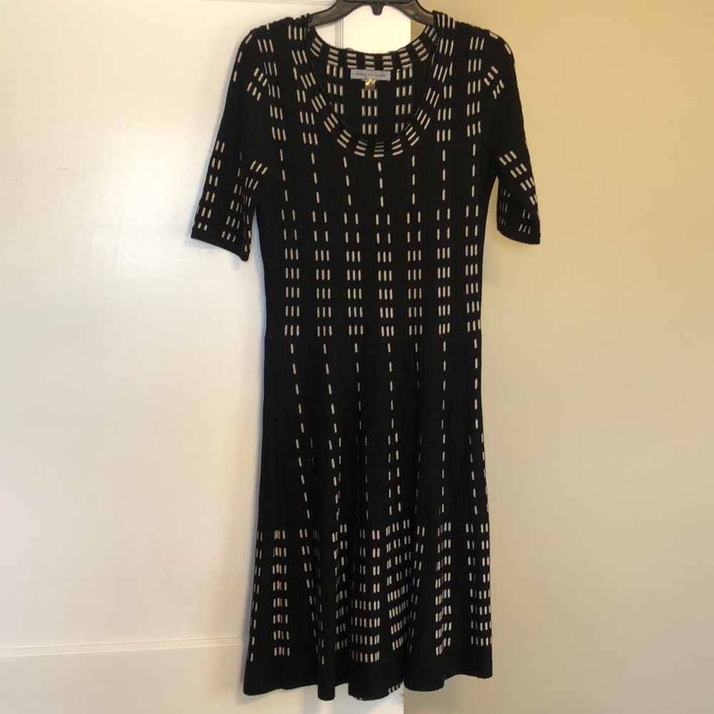 Fits like a small Black and white sweater dress